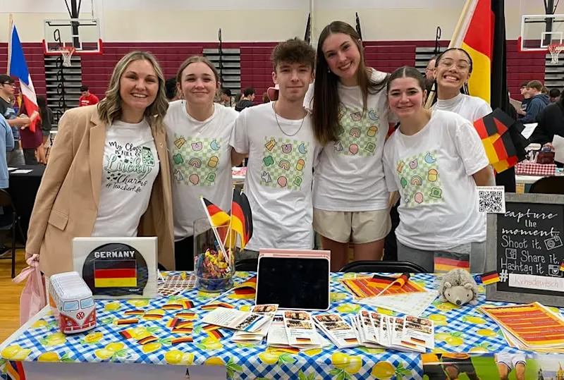 table presentation with group posing